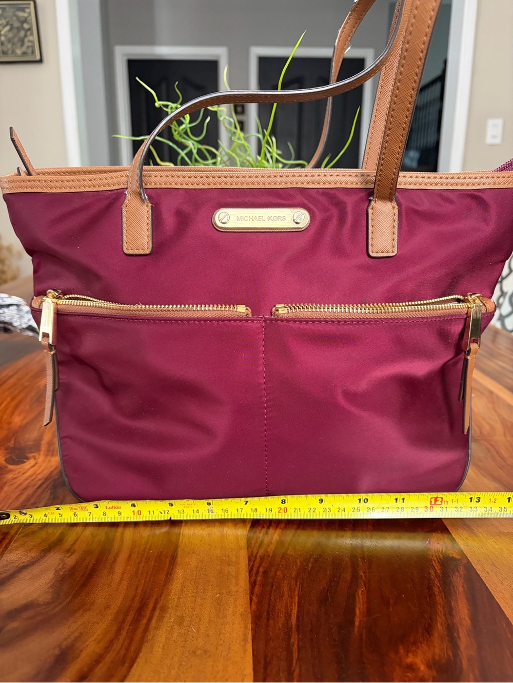 Michael Kors Burgundy Tote with Tan Trim and Gold Hardware  note wear on strap